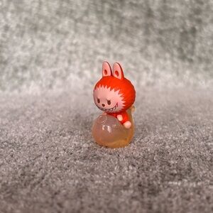 Labubu riding yellow Koi | Lucky Charm Series | POP MART Pop Bean mini figure